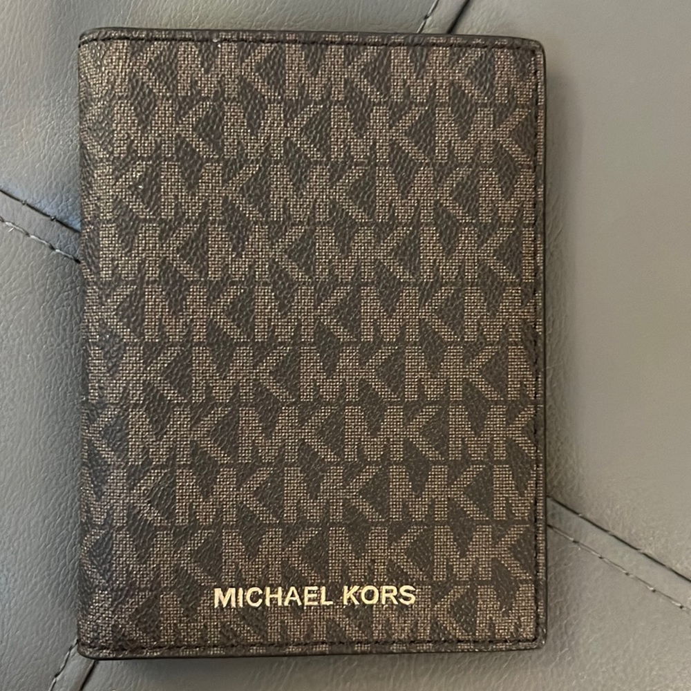 Like new Michael Kors passport wallet.